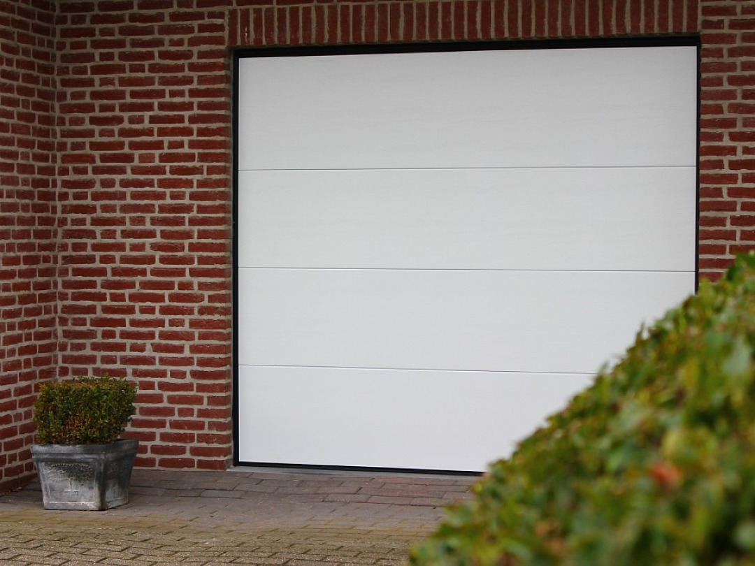 nieuwe sectionaalpoort Schriek -poorten - maximale plaatsbesparing - goede isolatie - elektrische aandrijving